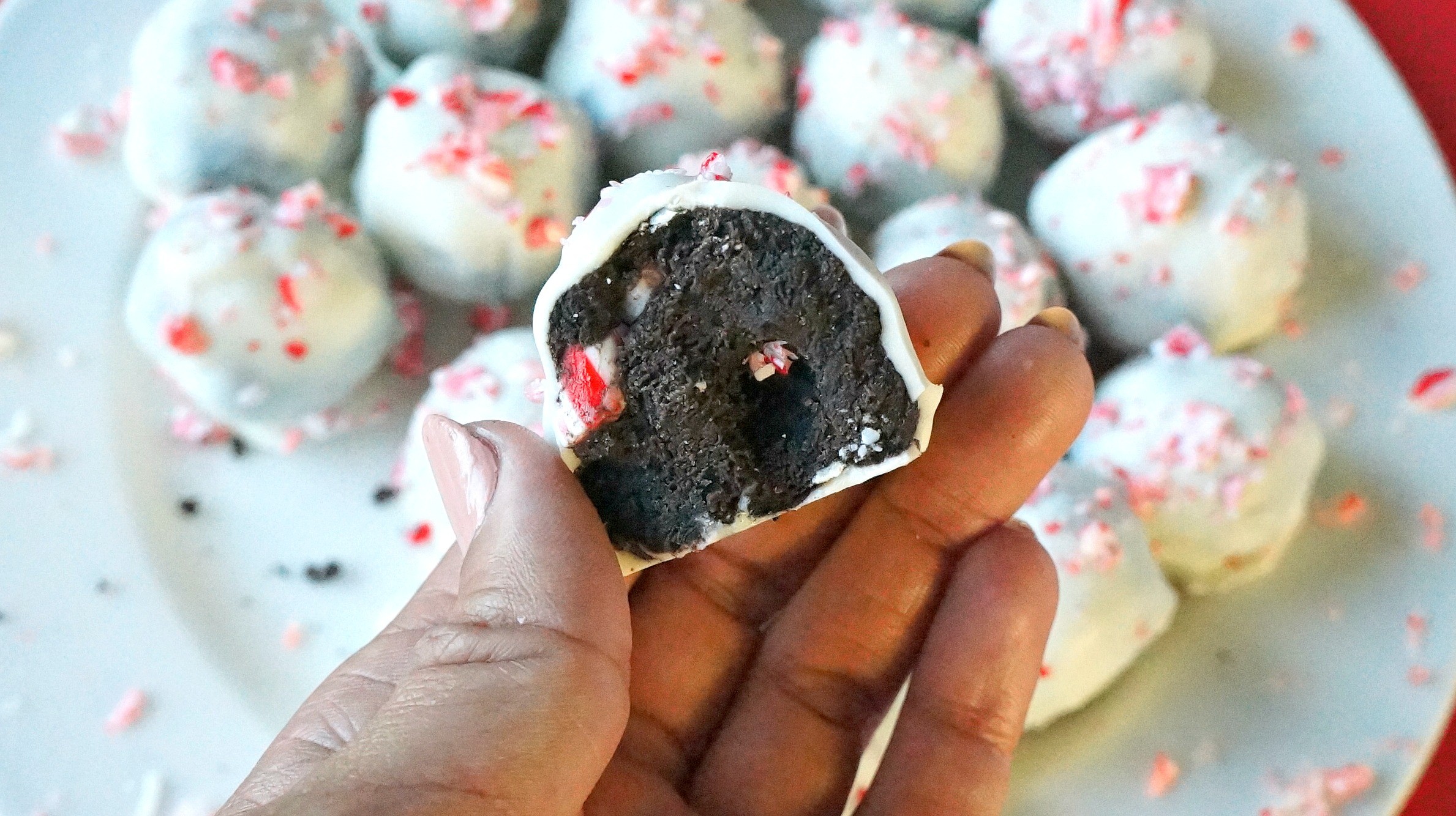 Bite into these white chocolate peppermint OREO cookie balls, a delicious no bake holiday dessert!