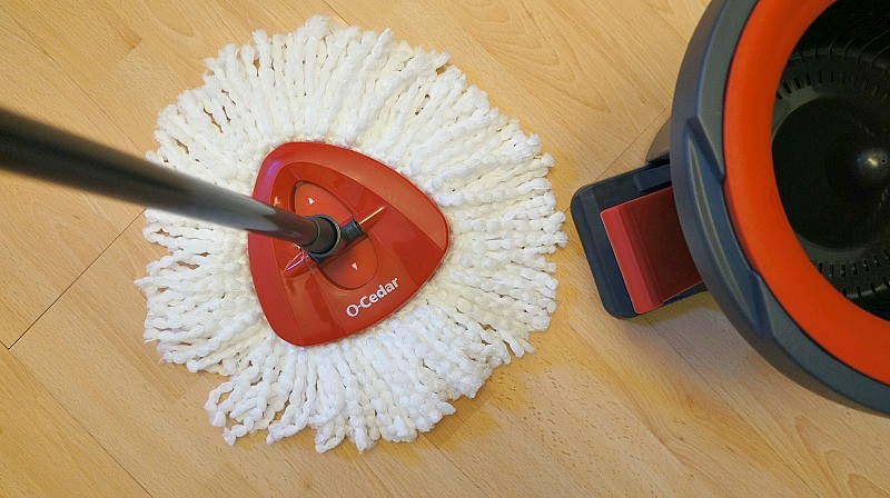 O-Cedar EasyWring™ Spin Mop & Bucket System, the triangular mop head is washable