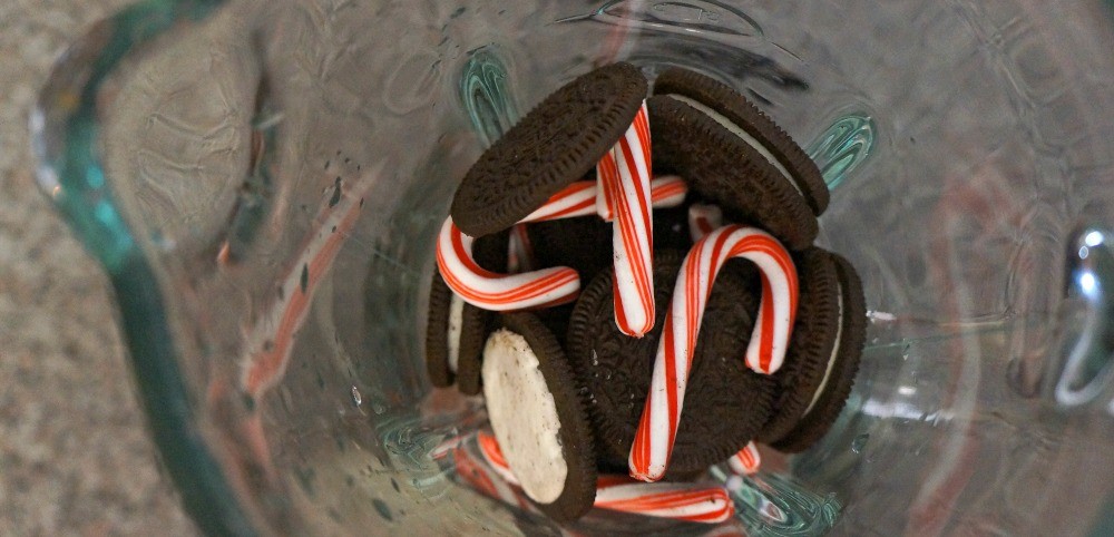 Crush cookies and candy canes in a blender or food processor